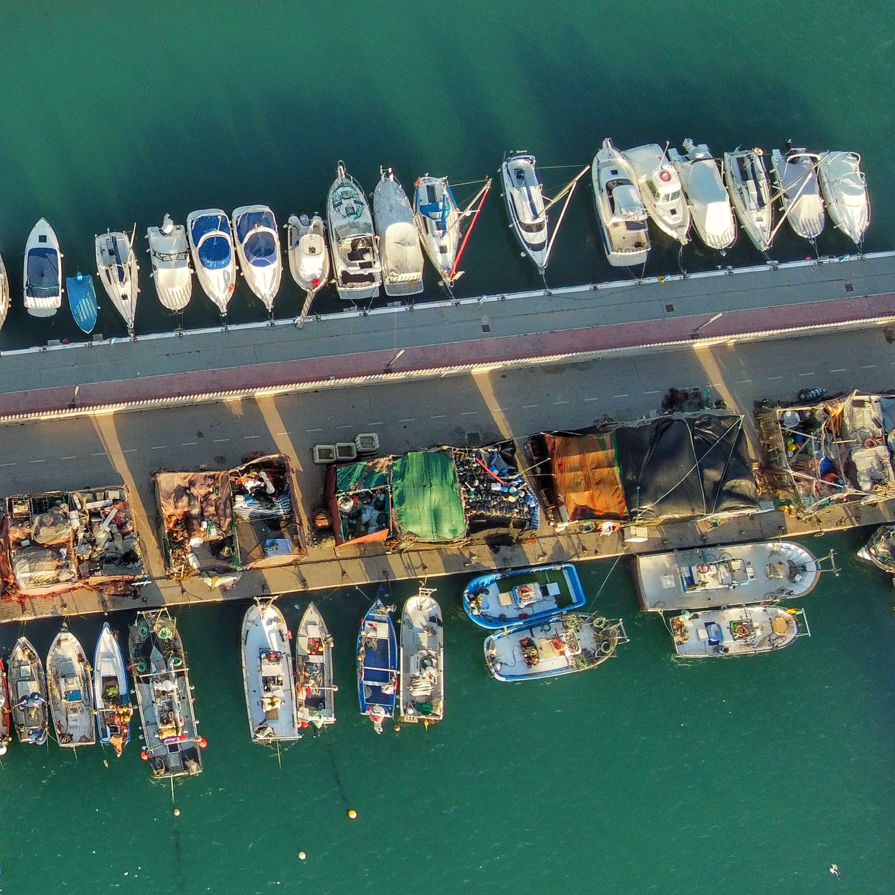 Top down drone photo of boats at Caleta de Velez in Malaga province