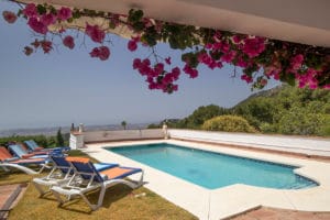 Photo of a private swimming pool in Mijas with bouganvilla by Jason Elliott